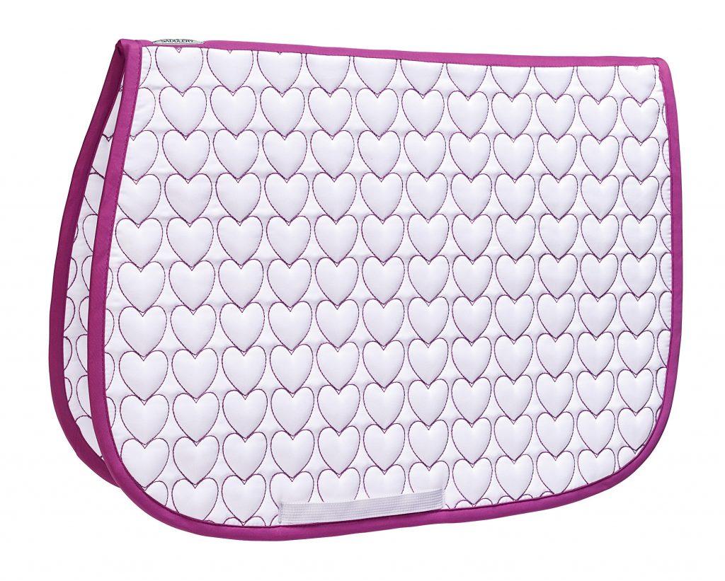 Dover Saddlery Novelty All-Purpose Saddle Pad in Pink/White Hearts. White quilting with pink-outlined heart pattern and pink piping. 