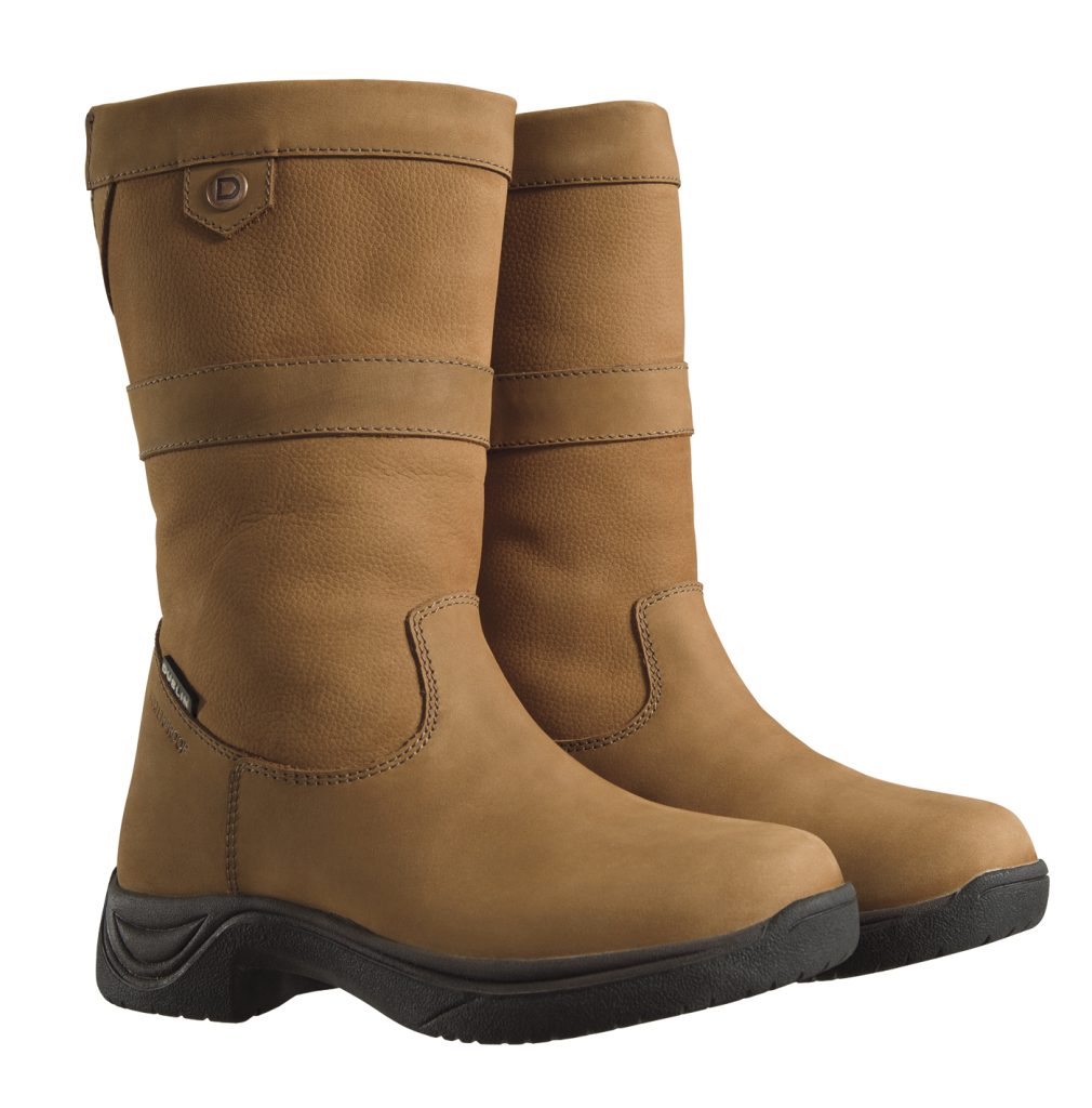 A pair of light brown country boots. The boots are mid-calf height with black tread on the bottom.