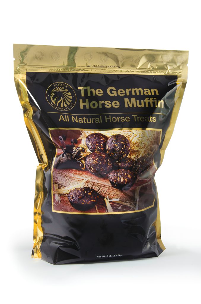 A gold and black bag of round, brown horse treats. The packaging says "The German Horse Muffin All Natural Horse Treats"
