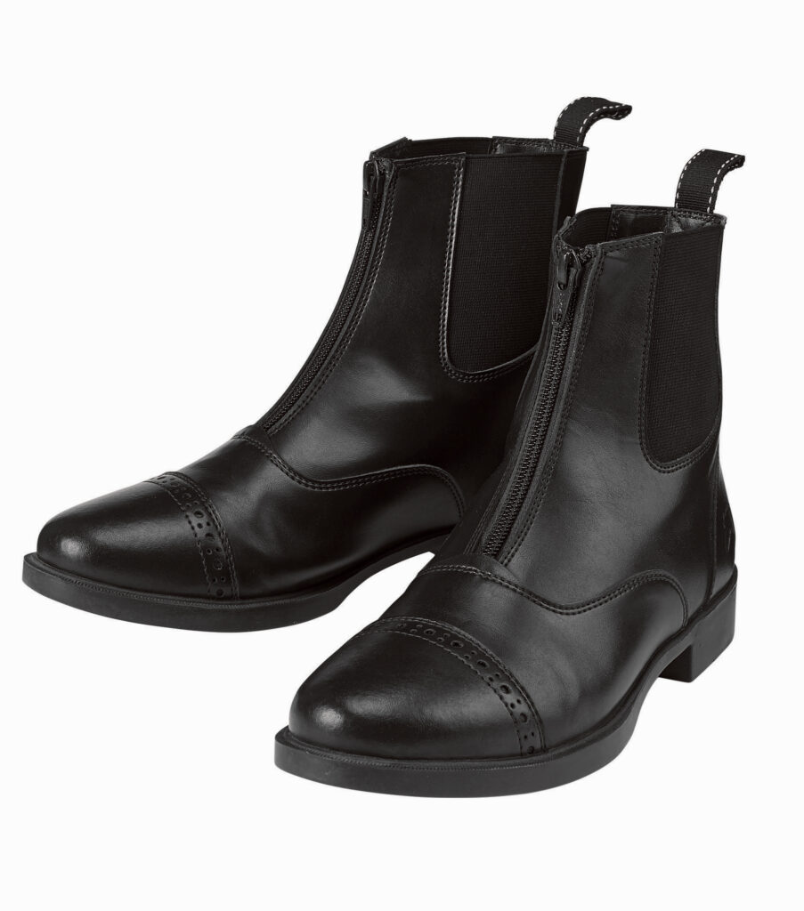 Black paddock boots with zippers on the front.