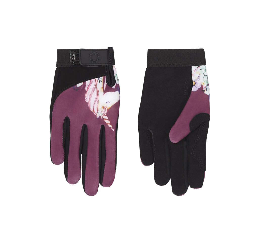 Magenta colored riding gloves with black palms. On top of the thumb area is a white cartoon unicorn.